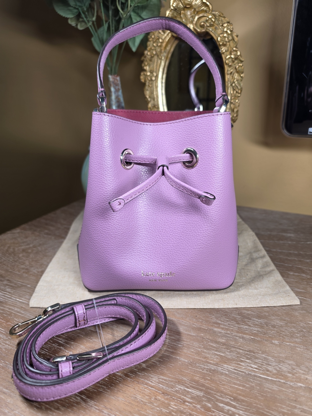 kate spade New York Eva Lavender Mauve Pebbled Leather Bucket Crossbody ($329)